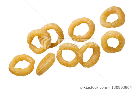 Corn rings flying on a white background. Isolated 130993904