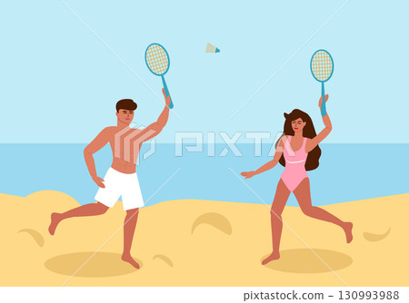 Young couple playing badminton on the beach Young couple playing badminton on the beach 130993988