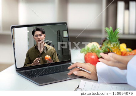 Nutrition Consultant Conducting Online Session with Client 130994079