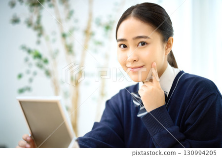 High school girl who cares about her skin 130994205