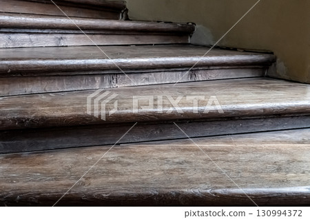 wooden stairs stairs close-up part of the interior of the house wooden stairs stairs close-up part of the interior of the house 130994372