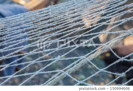 fishing net stretched close-up, tackle for catching seafood 130994606