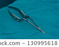 Microsurgical Scissors on Sterile Draping 130995618