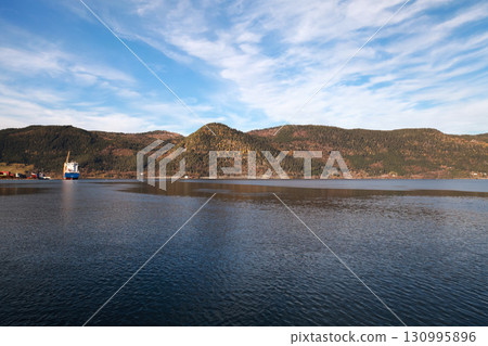 Norwegian landscape photography taken on a sunny day. Coastal mountains Norwegian landscape photography taken on a sunny day. Coastal mountains 130995896