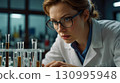 Scientist Examines Samples in Laboratory Setting 130995948