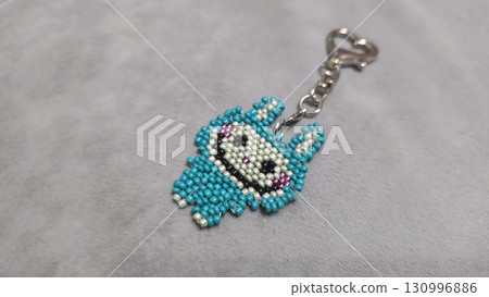Fashionable handmade keychain toy labubu made of beads, glass beads Copy space Fashionable handmade keychain toy labubu made of beads, glass beads Copy space 130996886