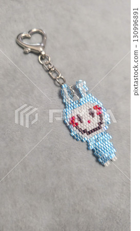 Fashionable handmade keychain toy labubu made of beads, glass beads Copy space Fashionable handmade keychain toy labubu made of beads, glass beads Copy space 130996891