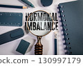 Hormonal imbalance awareness concept with magnifying glass 130997179