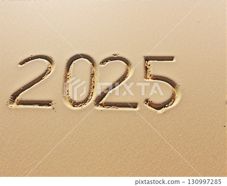 Christmas inscription 2025 on a summer beach. 130997285