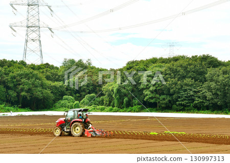 Tractor work in the field_03 130997313