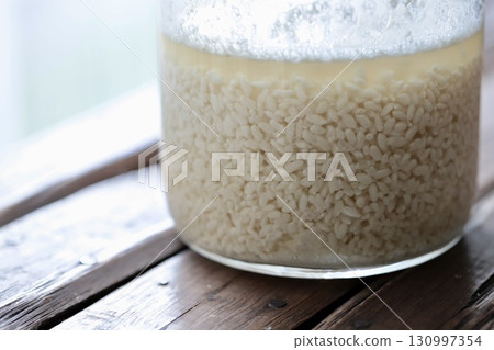 Freshly mixed homemade shio koji made from dried koji that has just begun to foam. 130997354