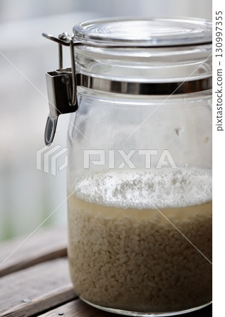 Freshly mixed homemade shio koji made from dried koji that has just begun to foam. 130997355