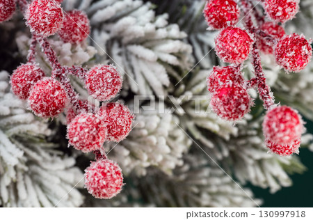 Christmas decoration with red berries and spruce branches Christmas decoration with red berries and spruce branches 130997918