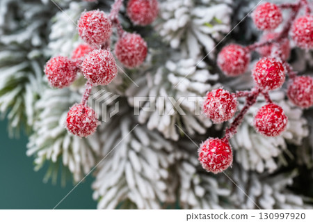 Christmas decoration with  red berries and spruce branches 130997920