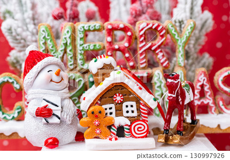 Christmas decoration with fir branches and snowmen 130997926