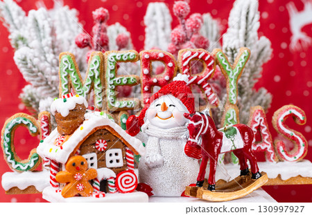 Christmas decoration with fir branches and snowmen 130997927