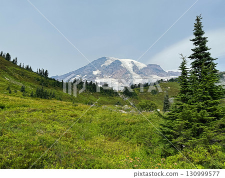 Mount Rainier's peak and green hills, Maun Rainier National Park, late August Mount Rainier's peak and green hills, Maun Rainier National Park, late August 130999577