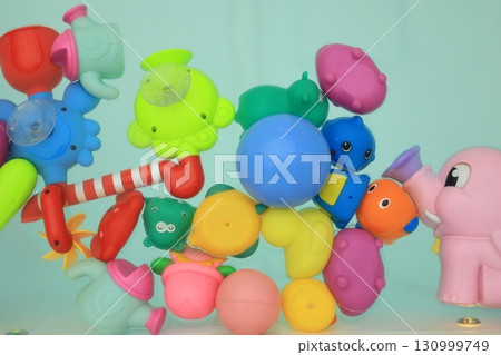 Colorful alphabet toys in the pool Colorful alphabet toys in the pool 130999749