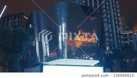 Shanghai, China. Hotel In Night Illumination. Night City Illumination. Urban Evening. Modern Architecture Shanghai, China. Hotel In Night Illumination. Night City Illumination. Urban Evening. Modern Architecture 130999824