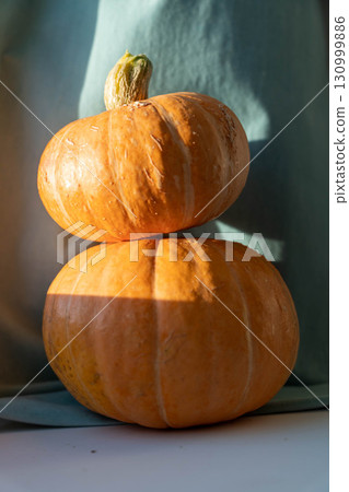 Stacked pumpkins creating autumn harvest still life Stacked pumpkins creating autumn harvest still life 130999886