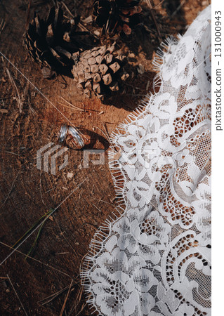 Wedding Rings and Lace on Tree Stump Wedding Rings and Lace on Tree Stump 131000943