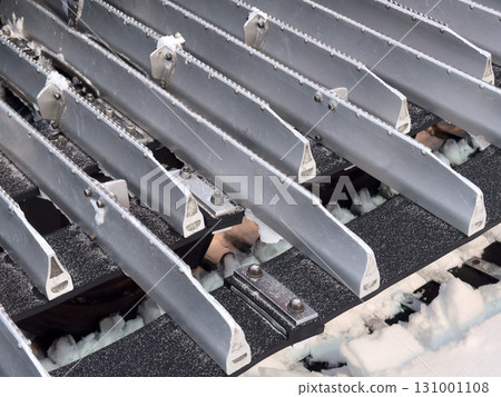 Snowcat machine for snow removal. Preparation ski trails. Snow groomer. Snowy tracks of snowcat in the mountains. Ratrac snowcat. Snow tucker 131001108