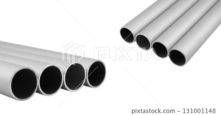 New high quality shiny galvanized stainless steel metal aluminium alloy pipes. Industrial construction materials isolated on white background. New high quality shiny galvanized stainless steel metal aluminium alloy pipes. Industrial construction materials isolated on white background. 131001148