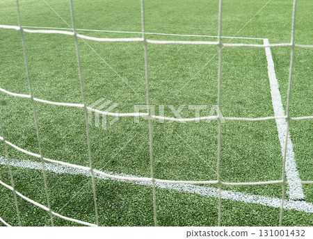 Close-up of a football net.Net on a football goal. Background of football, soccer net. Close-up of Soccer Goal Net 131001432