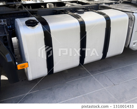 Truck fuel tank background. Aluminium gas tank. Car exterior details Truck fuel tank background. Aluminium gas tank. Car exterior details 131001433