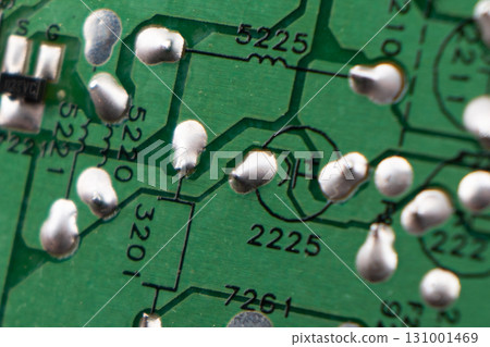 Circuit board with resistors microchips and electronic components background. Computer hardware technology. Integrated communication processor. Circuit board with resistors microchips and electronic components background. Computer hardware technology. Integrated communication processor. 131001469