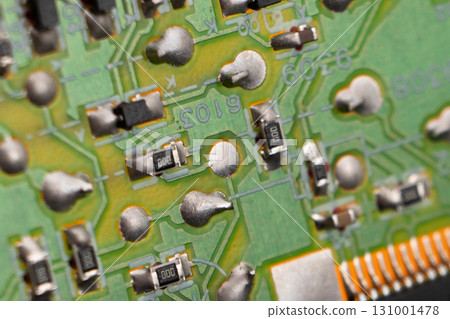 Circuit board with resistors microchips and electronic components background. Computer hardware technology. Integrated communication processor. Circuit board with resistors microchips and electronic components background. Computer hardware technology. Integrated communication processor. 131001478