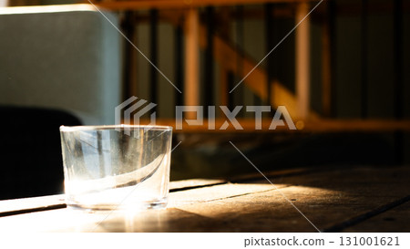 A glass placed in the sun 131001621