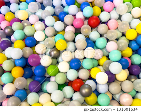 Colored plastic ball in the game pool. Many colour plastic balls for background 131001634