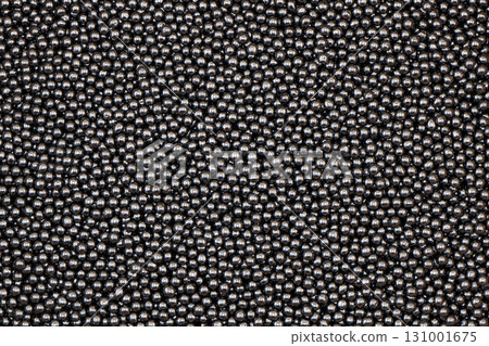 Shotgun pellets. Birdshot texture background. A pile of shotgun pellets texture background Shotgun pellets. Birdshot texture background. A pile of shotgun pellets texture background 131001675