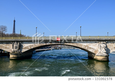 Beautiful view of Paris from a Seine River cruise ship 131002378