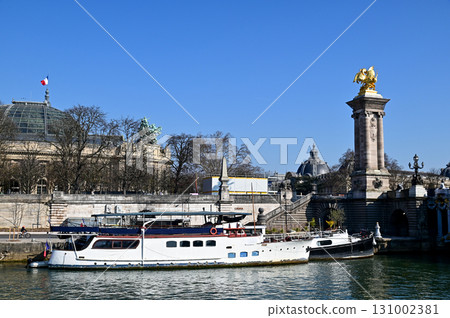 Beautiful view of Paris from a Seine River cruise ship 131002381