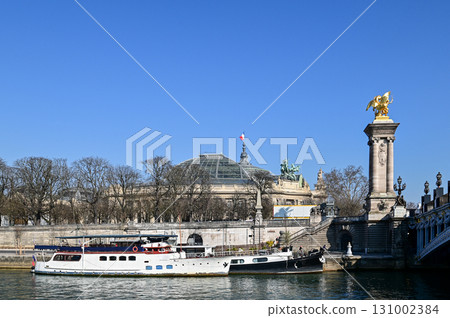 Beautiful view of Paris from a Seine River cruise ship 131002384