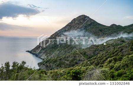 Coastline view Roadtrip Winding road along rocky coast of Cap Corse peninsula on Corsica island France Coastline view Roadtrip Winding road along rocky coast of Cap Corse peninsula on Corsica island France 131002846