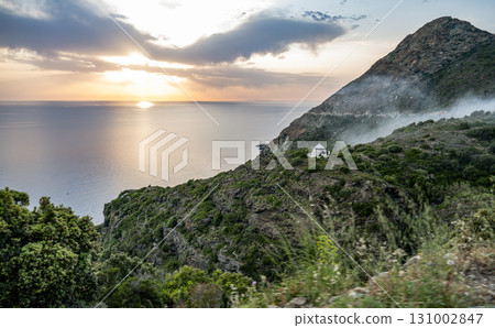Coastline view Roadtrip Winding road along rocky coast of Cap Corse peninsula on Corsica island France Coastline view Roadtrip Winding road along rocky coast of Cap Corse peninsula on Corsica island France 131002847