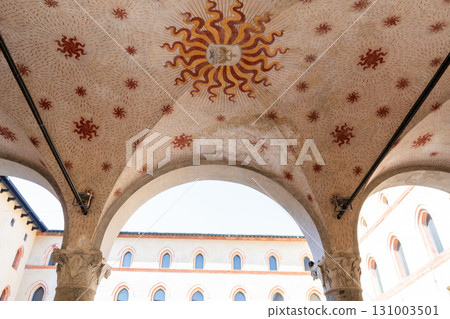 Detail of an antique arch. Sforza Castle in Milan. Ancient Italian architecture. Detail of an antique arch. Sforza Castle in Milan. Ancient Italian architecture. 131003501