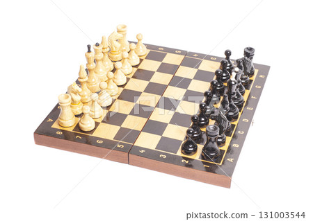 Chess board with chess pieces isolated on white Chess board with chess pieces isolated on white 131003544