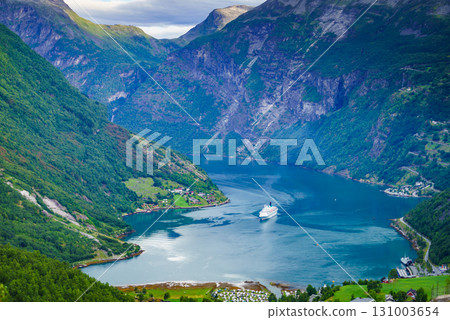 Fjord Geirangerfjord with cruise ship, Norway. Fjord Geirangerfjord with cruise ship, Norway. 131003654