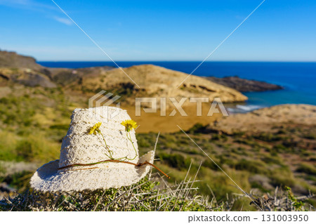Summer hat on sunny sea coast, Murcia Spain Summer hat on sunny sea coast, Murcia Spain 131003950