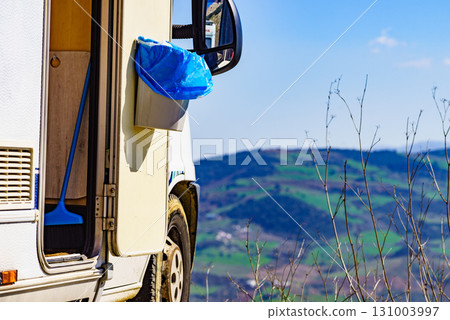 Camper door with trash can. Camper door with trash can. 131003997