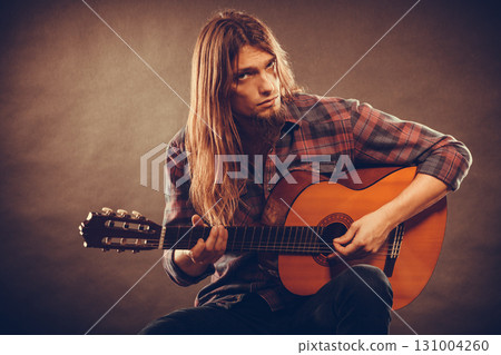 Guitarist is playing the guitar. Guitarist is playing the guitar. 131004260