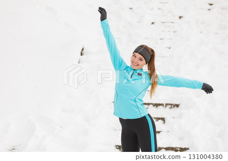 Young woman outside during winter. Young woman outside during winter. 131004380