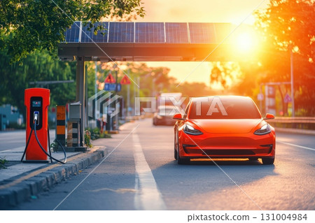 Modern Electric Vehicle Charging Station with Solar Panels and Renewable Energy Source 131004984