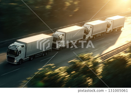 Motion Blur of Trucks in Logistics During Golden Hour with a Green Background 131005061