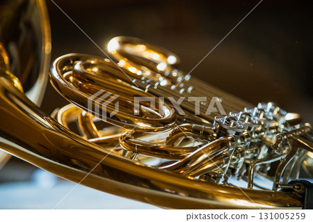 Horn instrument, hands playing horn player in philharmonic orchestra 131005259