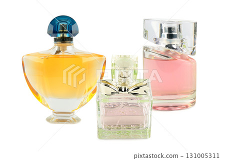 Three Perfume Bottles of Different Shapes and Colors. Three Perfume Bottles of Different Shapes and Colors. 131005311